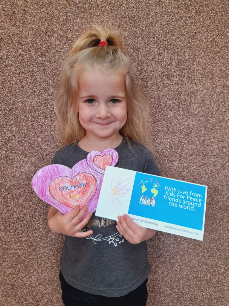 Polish student with decorated heart and envelope
